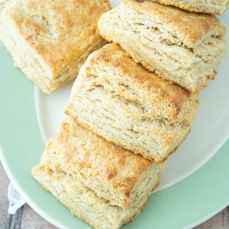 closeup of sour cream biscuits on plate