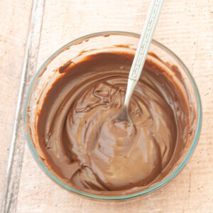 melted chocolate chips with fork