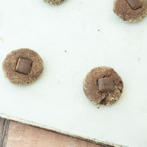 placing Heath bar pieces in cookies