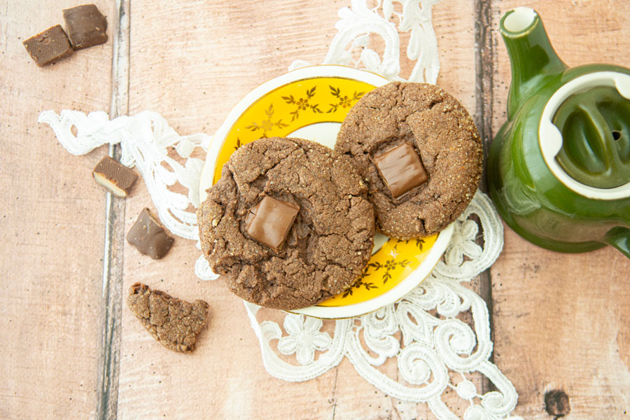 Heath bar chocolate cookies on plate with teapot