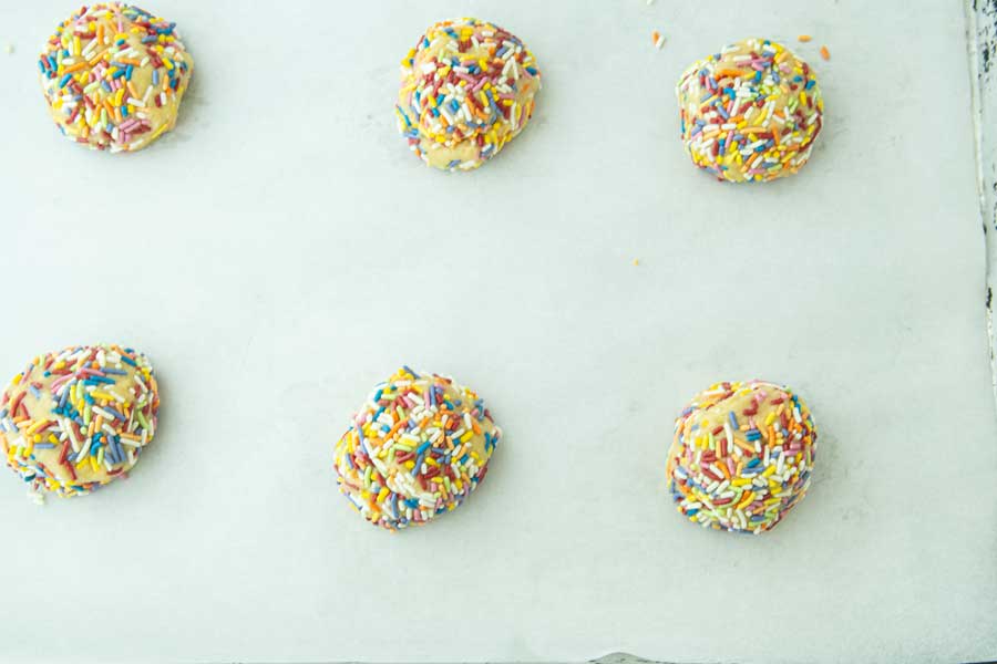 confetti cookies on sheet tray ready to bake