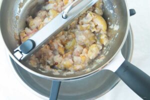 straining pears in food mill