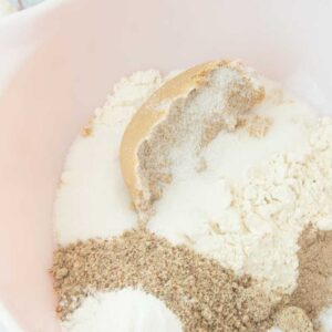 dry ingredients for applesauce bread in bowl