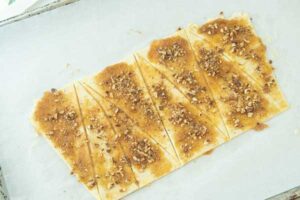 rugelach topped with jam ready to roll into crescents