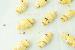 rugelach brushed with egg wash and sprinkled with pearl sugar