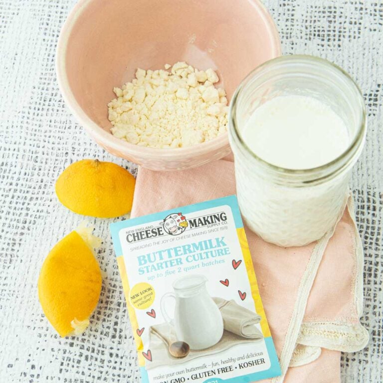 buttermilk in jar, lemons, buttermilk culture, and dried buttermilk in bowl