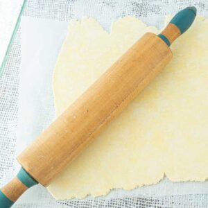 rolling out pastry for quiche