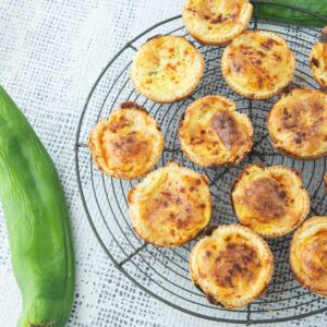 whole green chile and green chile mini quiches on wire rack