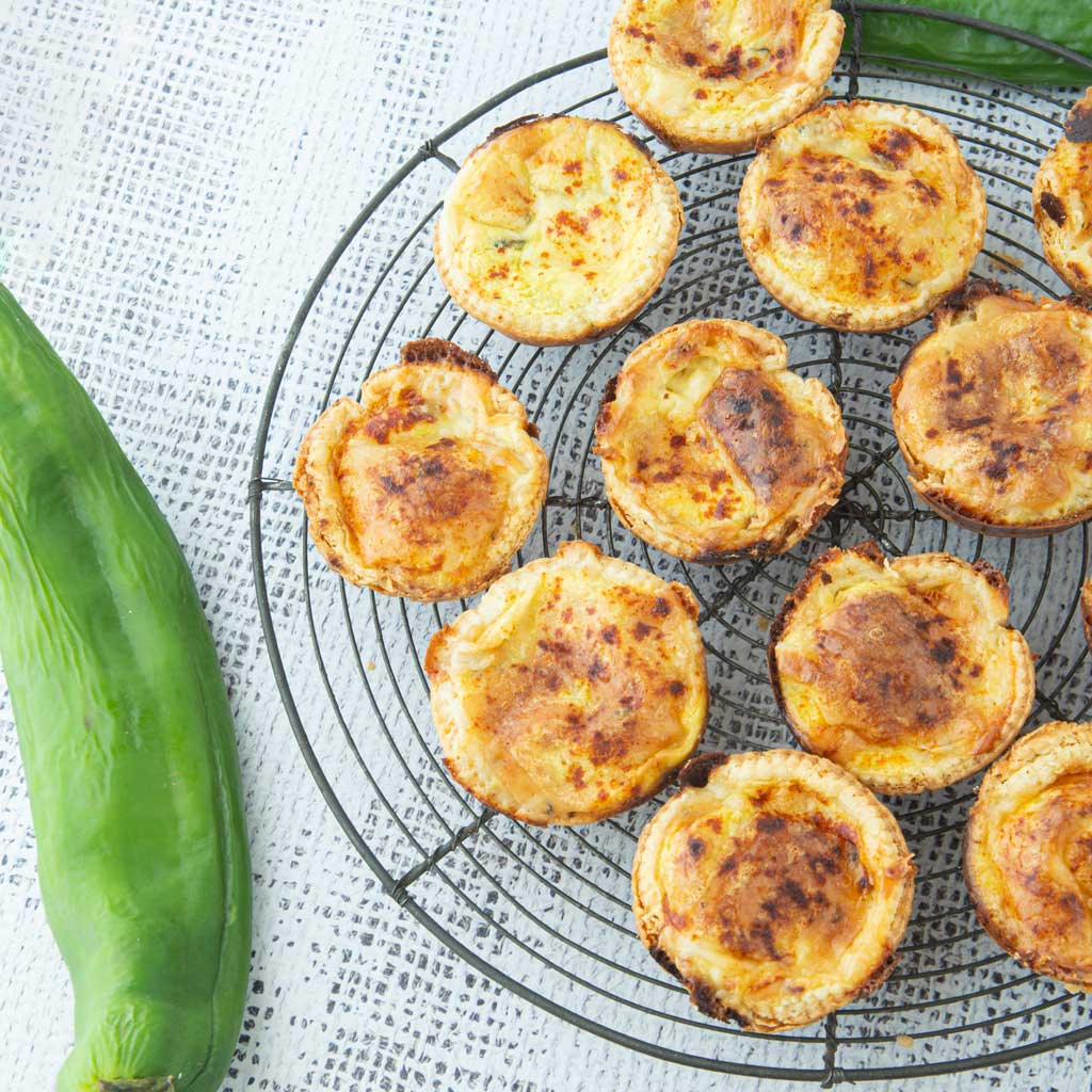 whole green chile and green chile mini quiches on wire rack