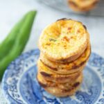 whole green chile and closeup of green chile mini quiches on plate
