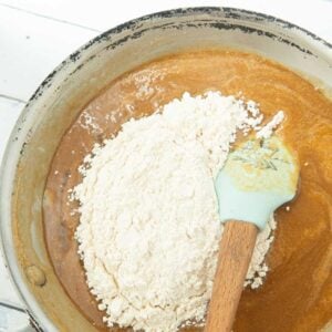 mixing flour into batter