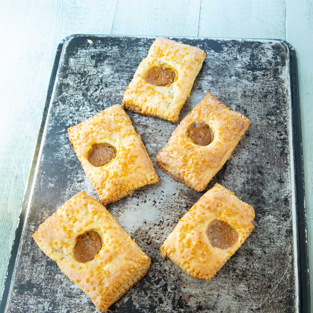 pumpkin hand pies on sheet tray