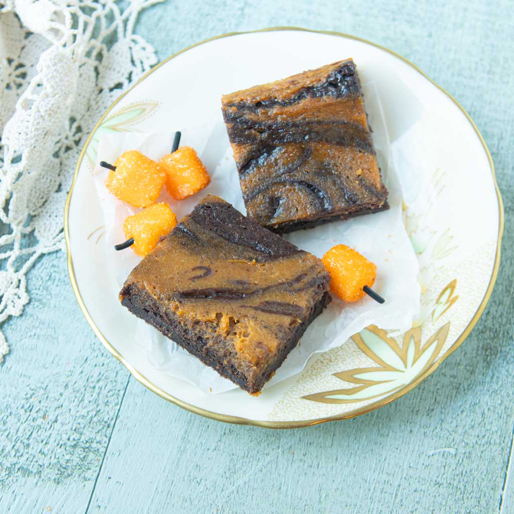 pumpkin brownies on plate with marshmallow pumpkins