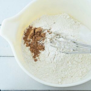 whisking flour and cinnamon