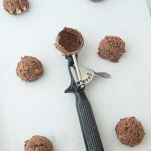 cookie scoop with balls of Twix cookie dough