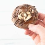 hand holding a twix cookie