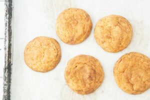 pumpkin snickerdoodles on sheet tray