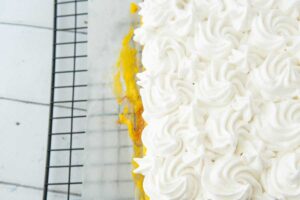closeup of swirls of meringue on top of lemon bars