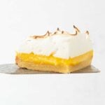lemon meringue bar on pie server