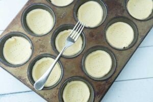 docking puff pastry in muffin pan