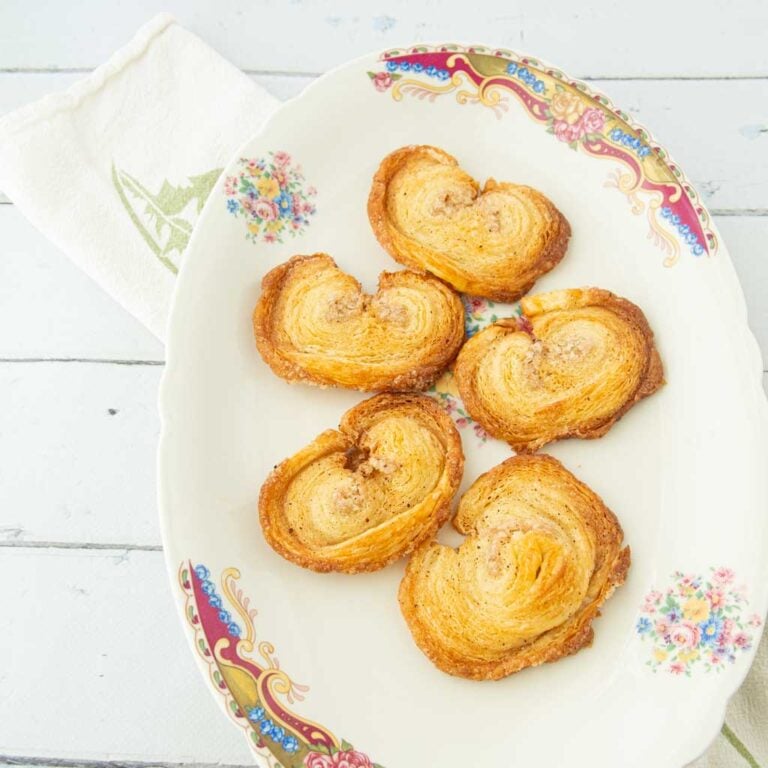 baked palmiers on plate with napkin