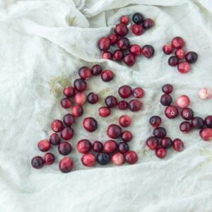 cranberries drying on a kitchen towel