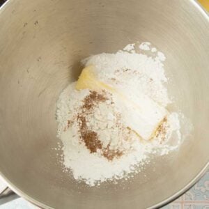 butter, powdered sugar, and spices in bowl
