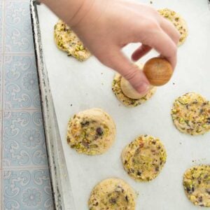 smashing dough with tart tamper