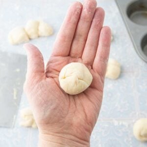 rolling dough ball in hand