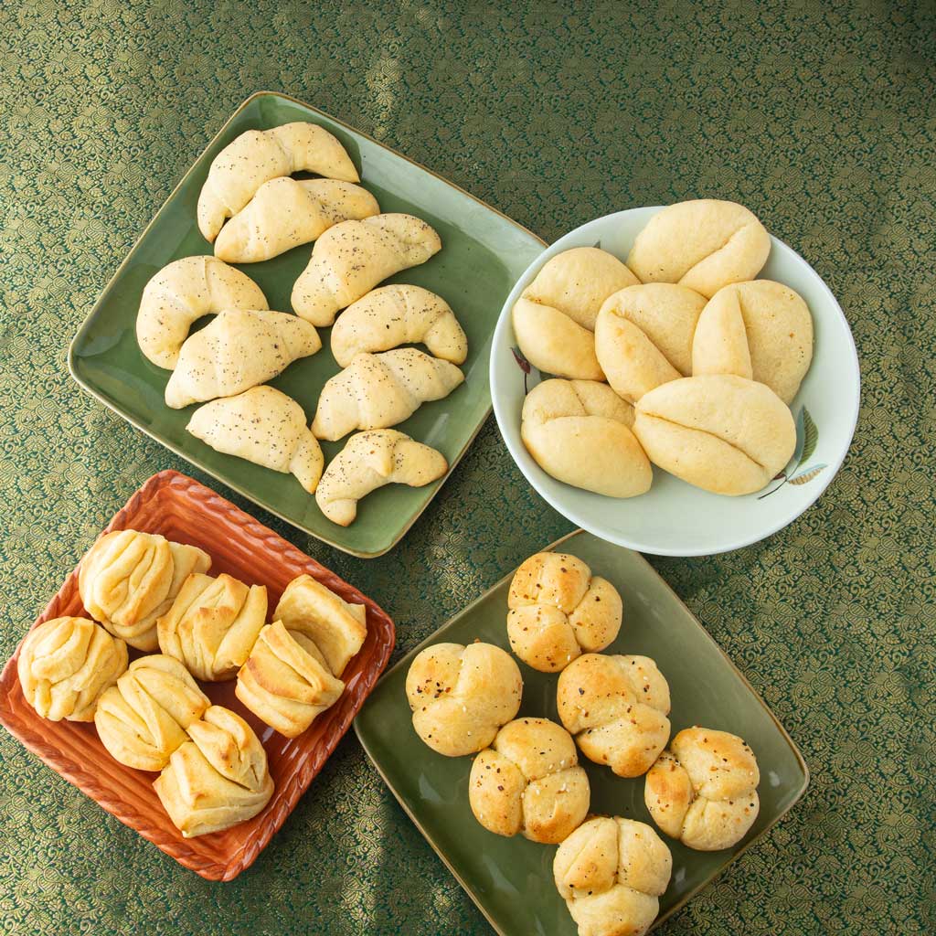 assorted potato rolls on plates