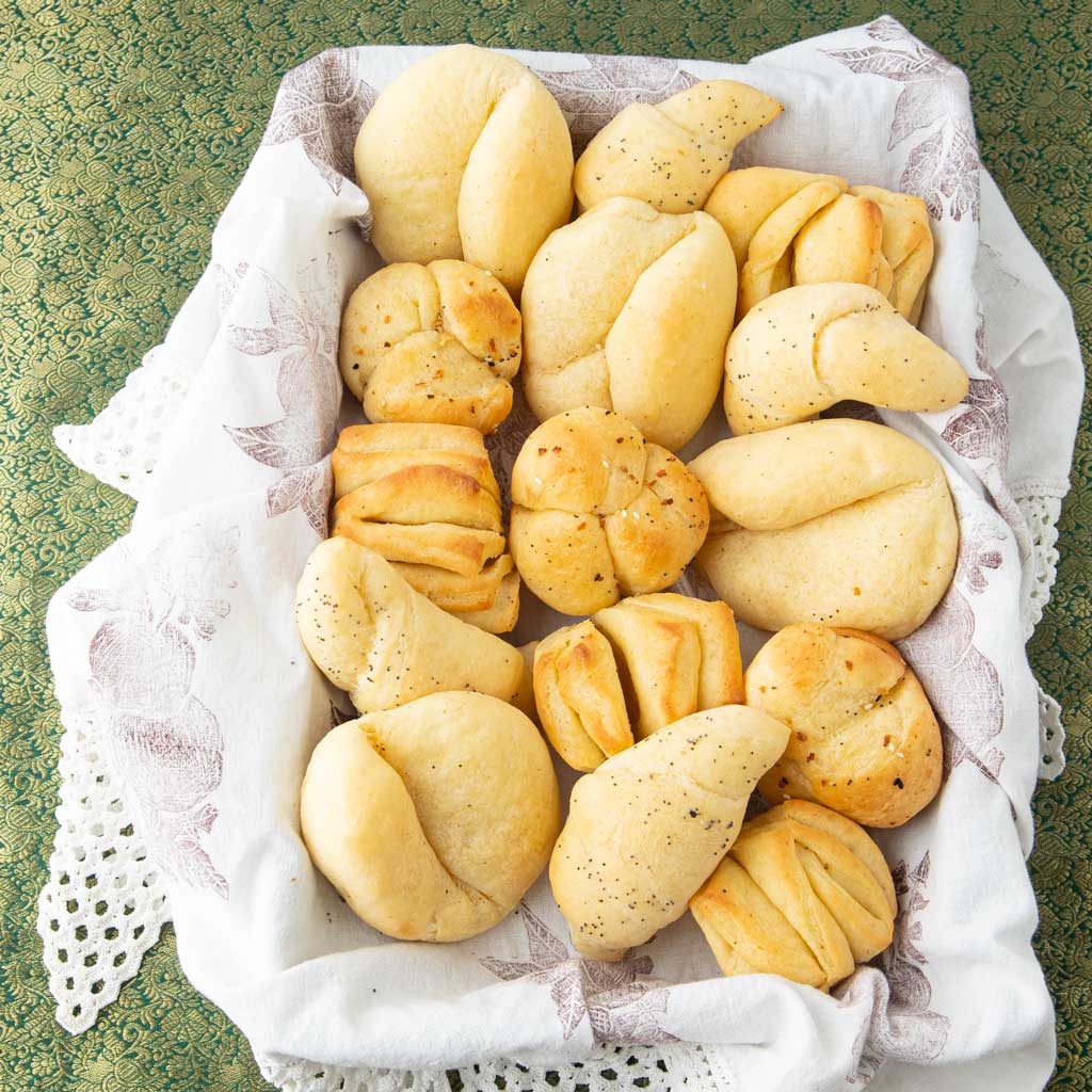 assorted potato rolls in basket
