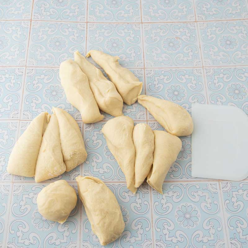 dividing dough with dough scraper