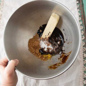 mixing butter with spices and molasses