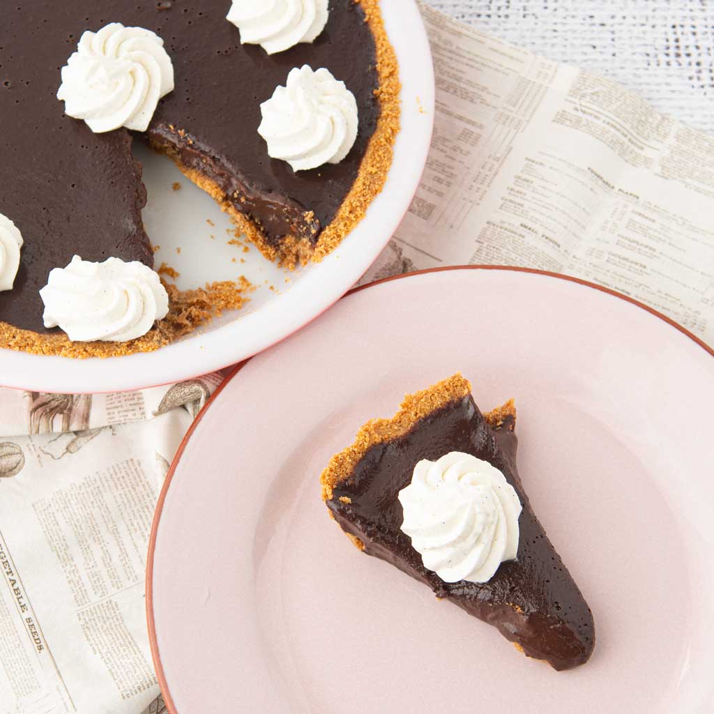 chocolate pie on plate with chocolate pie in pie plate
