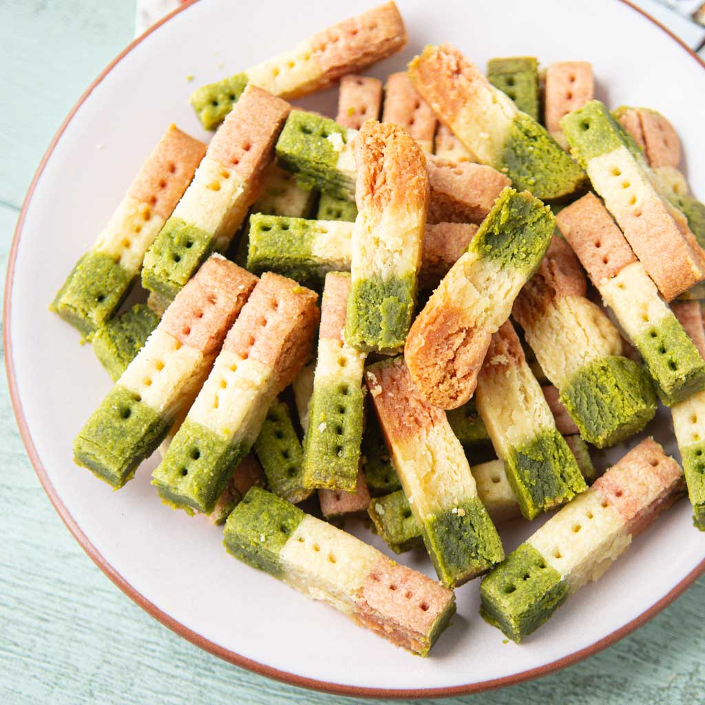 strawberry matcha shortbread fingers on plate