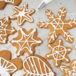 gingerbread cookies with royal icing on sheet tray