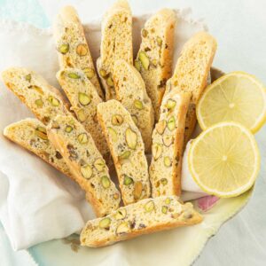 lemon pistachio biscotti with lemon slices