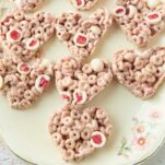 plate of strawberry cereal treats, text overlay