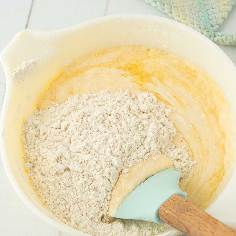 mixing flour into buttermilk and egg mixture