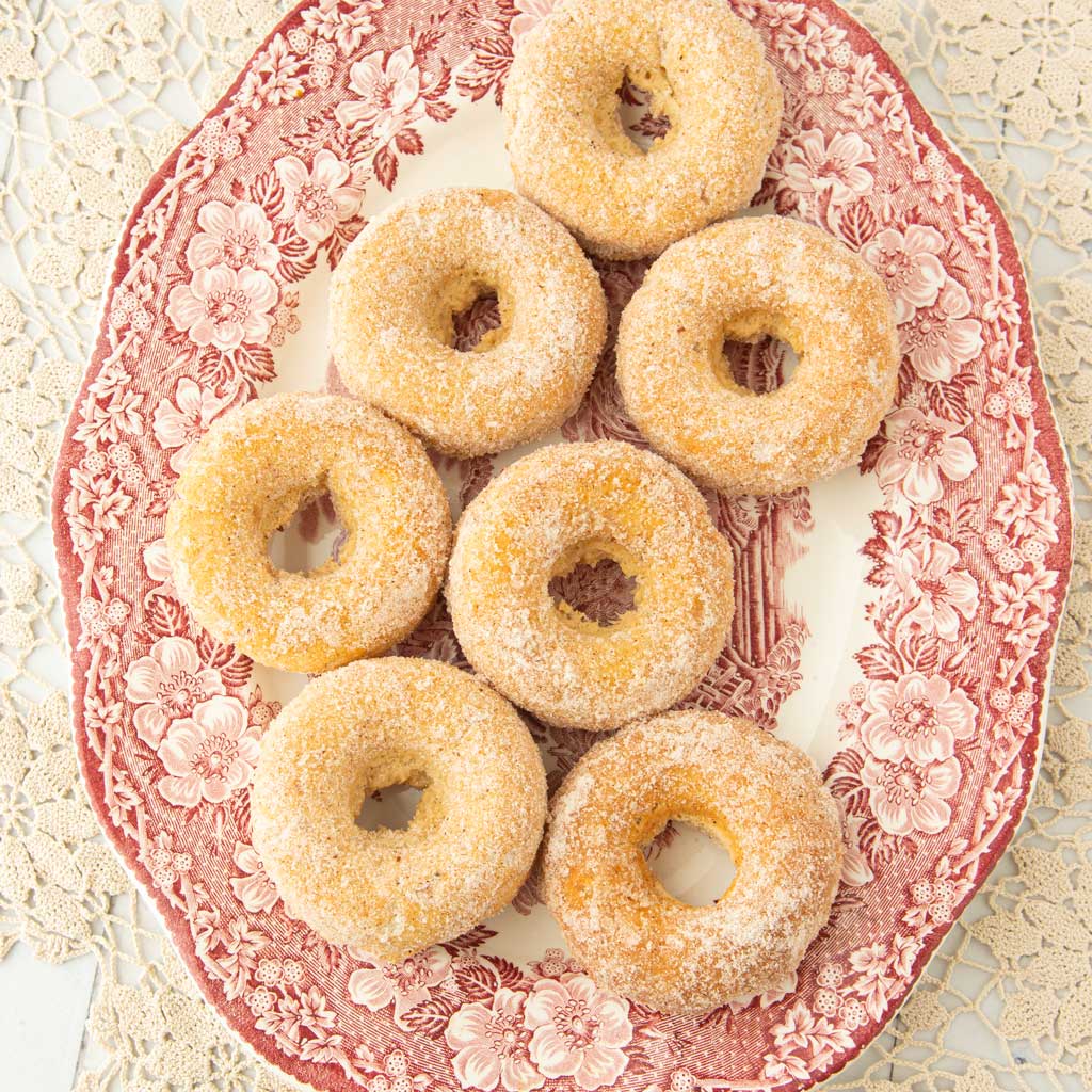 plate of cinnamon sugar baked donuts