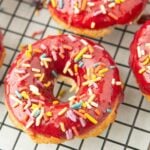 closeup of blackberry glazed donuts