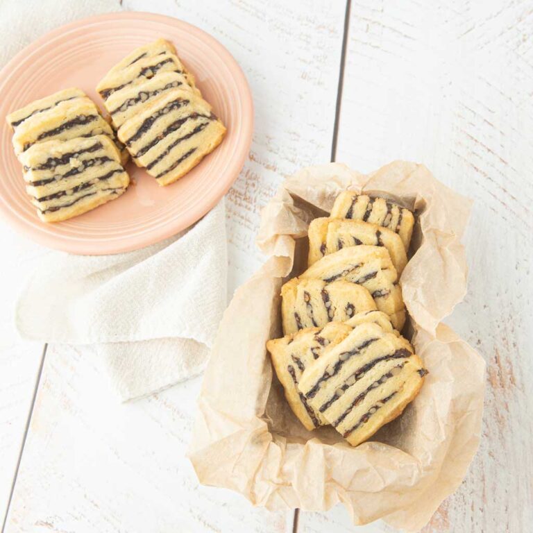 striped date cookies on plates