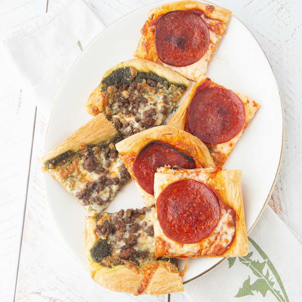 slices of puff pastry pizza on plate