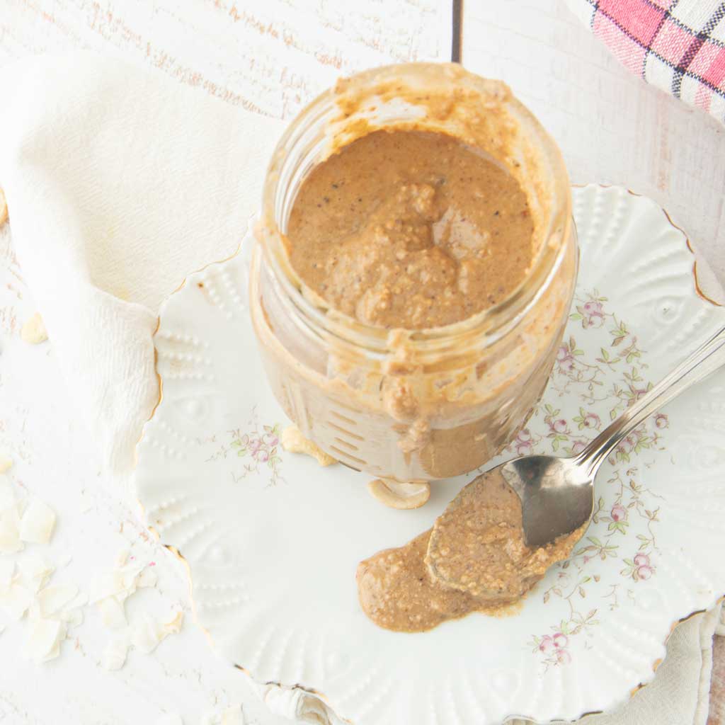 top down shot of granola butter with spoon of granola butter