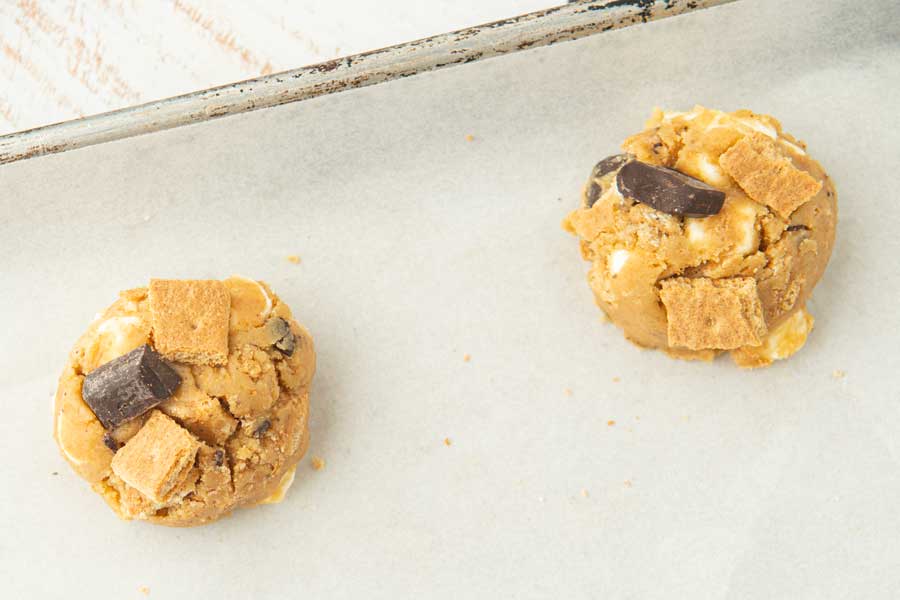 balls of s'mores cookies on sheet pan