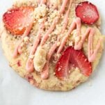 close up of strawberry crumb cake cookie, text overlay