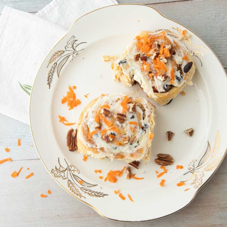 carrot cake cinnamon rolls on plate