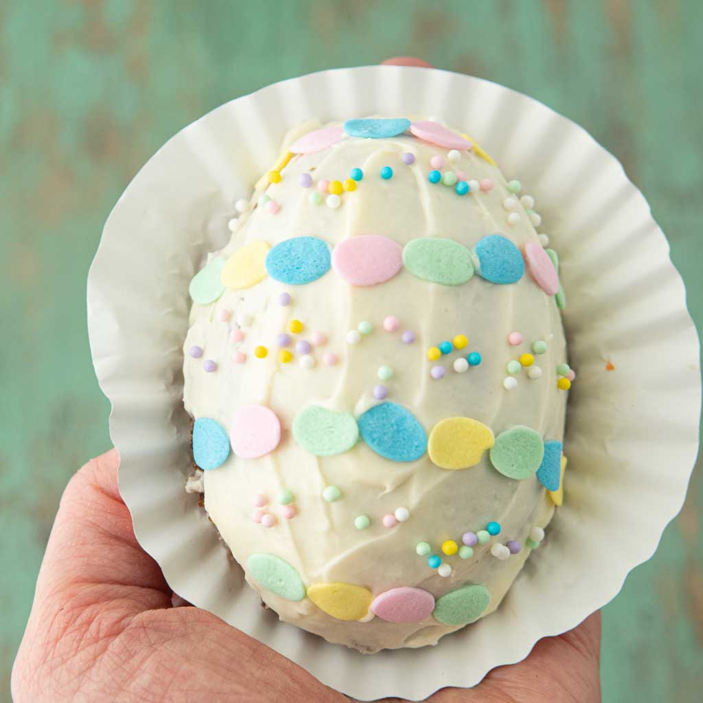 hand holding mini Easter egg cake
