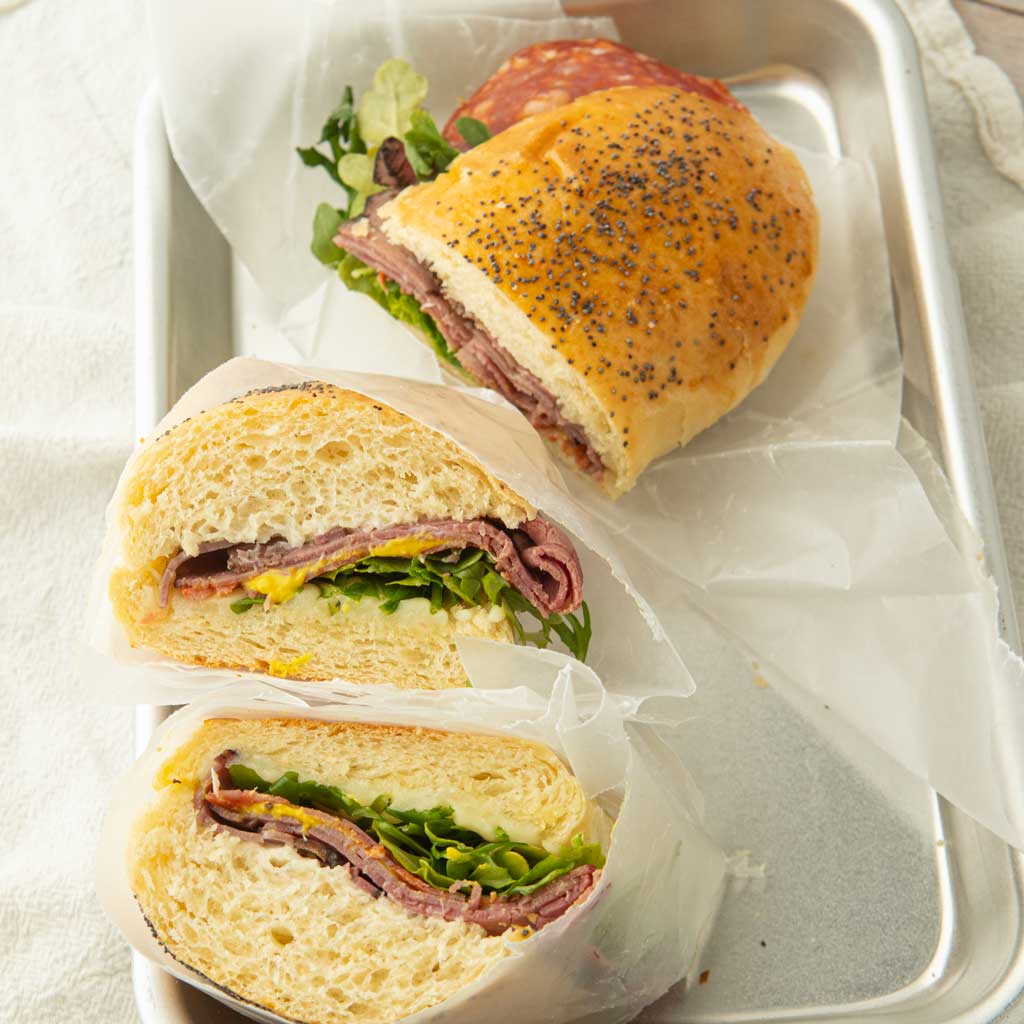 cross section of hoagie buns made into sandwiches