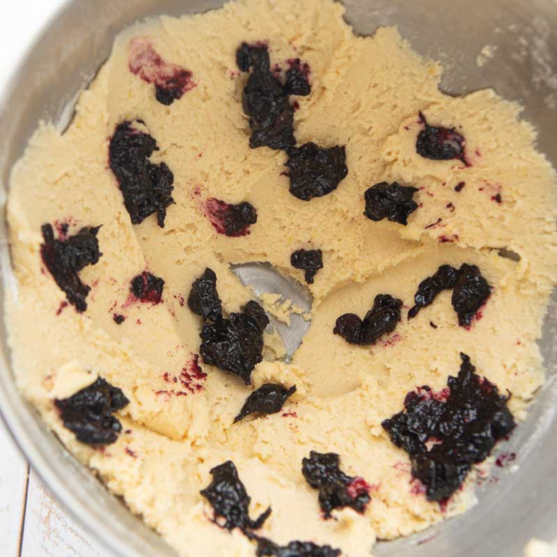 splotches of jam on lemon cookie dough